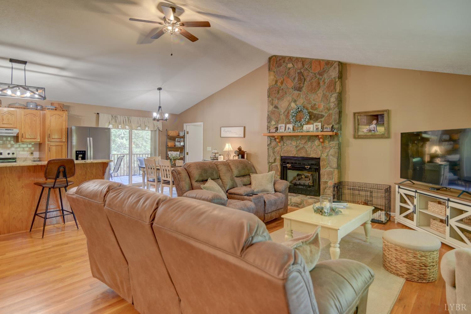 151 Anderson Place Rustburg, VA 24588 - Photo 55 of 57 Main level open floor plan with access to large screened in porch, with exterior entrance into bathroom for pool guests