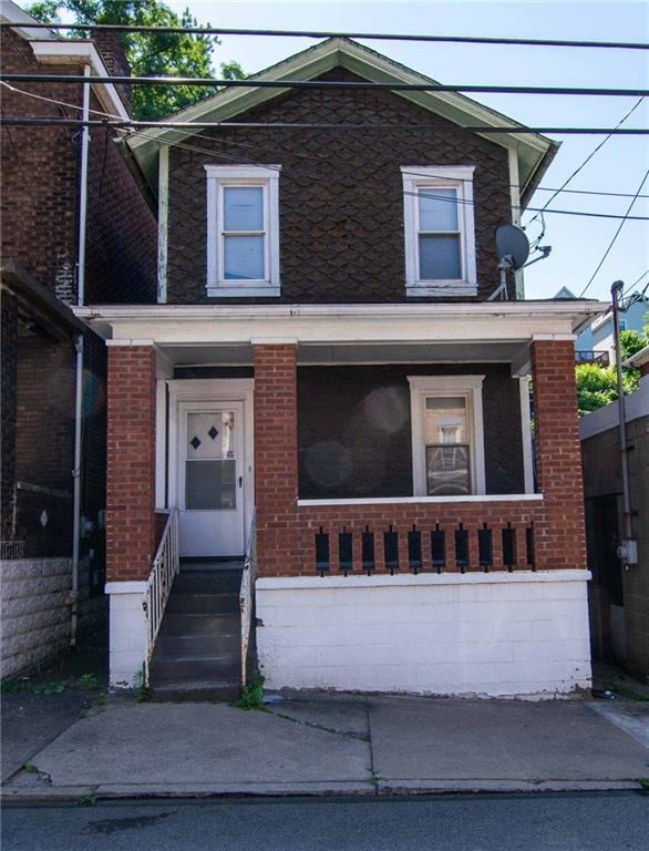 238 Fleet Street Braddock, PA 15104 - Photo 1 of 14 a front view of house