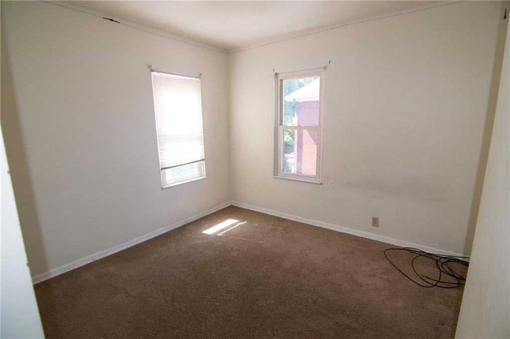 238 Fleet Street Braddock, PA 15104 - Photo 13 of 14 an empty room with windows