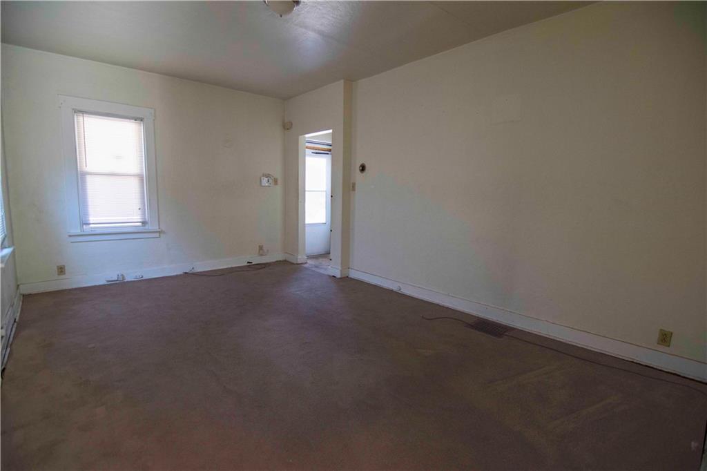 238 Fleet Street Braddock, PA 15104 - Photo 14 of 14 an empty room with a window