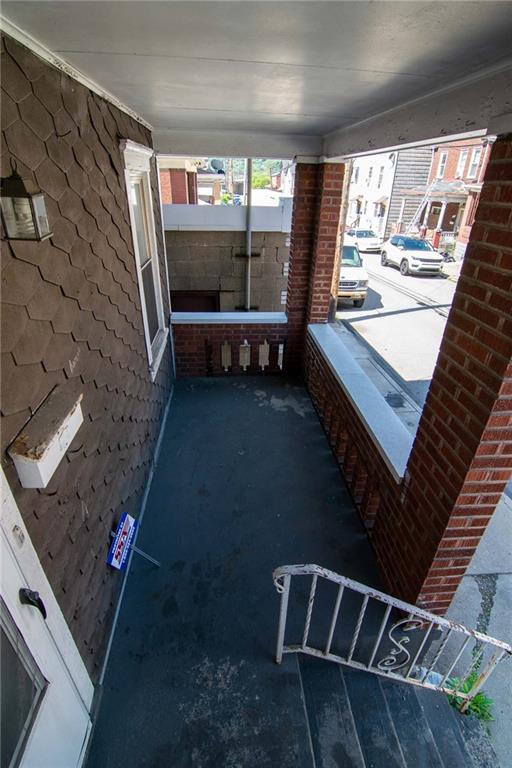 238 Fleet Street Braddock, PA 15104 - Photo 2 of 14 a view of balcony and wooden floor