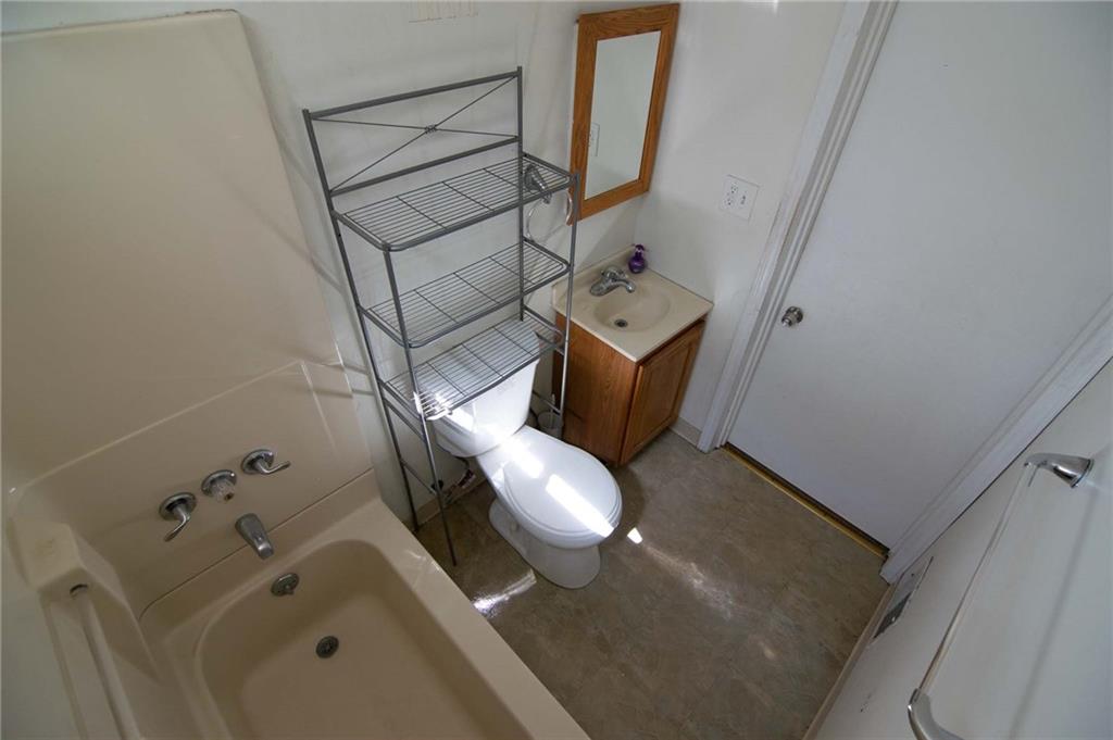 238 Fleet Street Braddock, PA 15104 - Photo 5 of 14 a bathroom with a sink and toilet