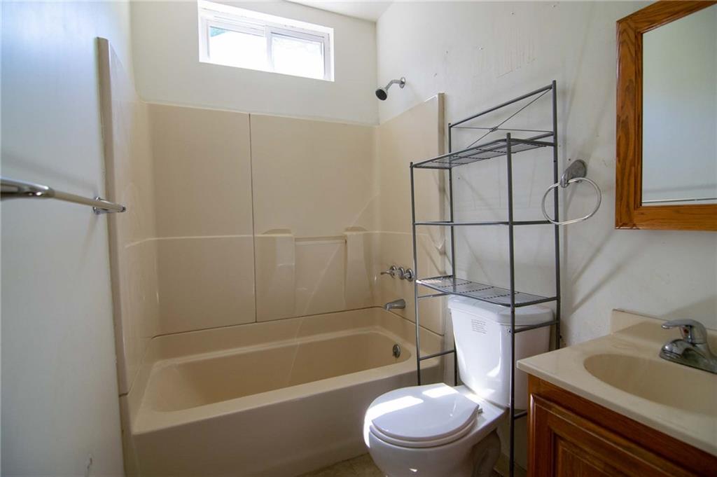 238 Fleet Street Braddock, PA 15104 - Photo 7 of 14 a bathroom with a sink toilet and shower