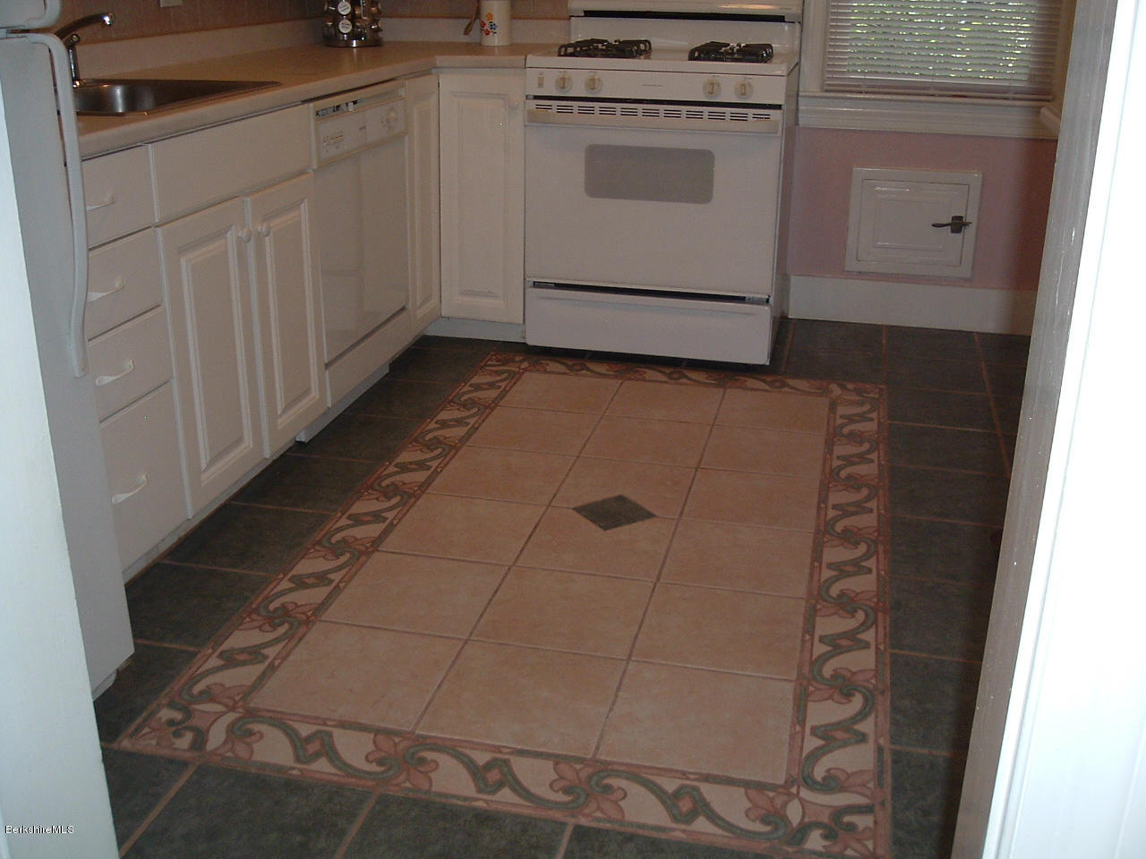 217 Holmes Road Pittsfield, MA 01201 - Photo 13 of 22 217 Holmes kitchen ceramic floor