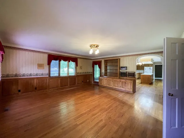 a room with furniture and a fireplace