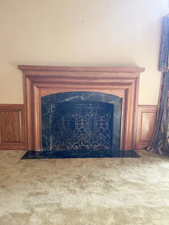 a spacious bathroom with a double vanity sink a mirror and a bathtub