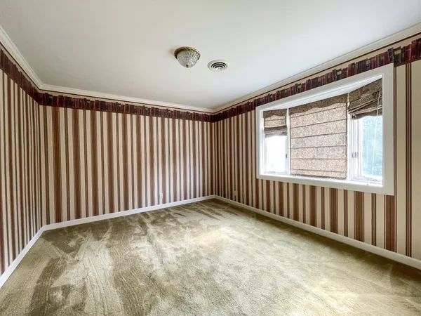 a picture of a room with a white wall and a white wall