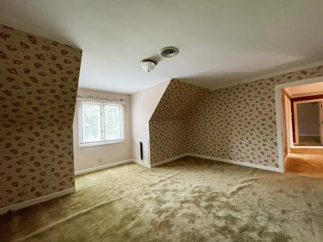 a picture of a room with a white wall and a white wall