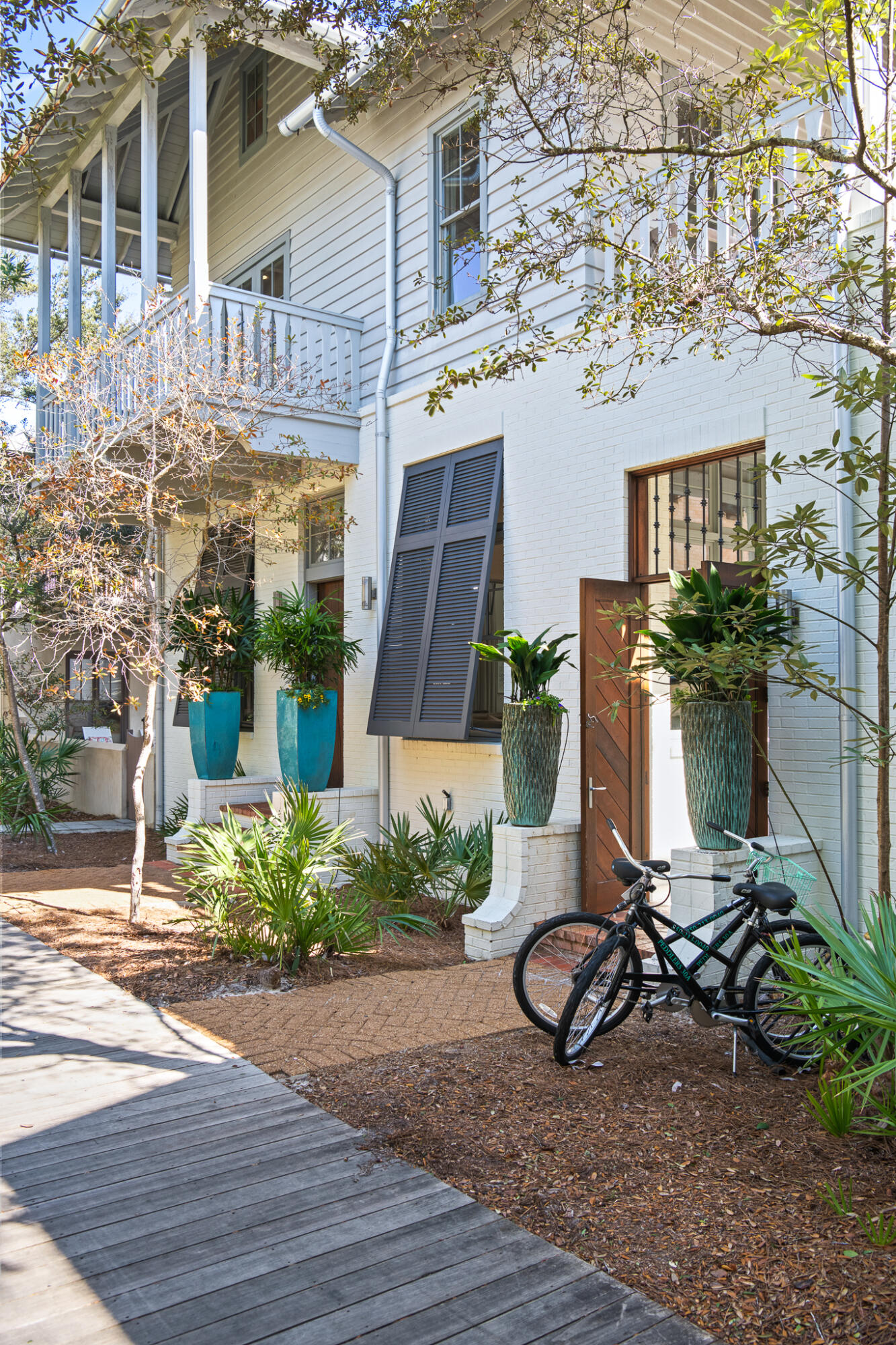 188 Round Road Inlet Beach, FL 32461 - Photo 6 of 98 a view of a house with sitting area and potted plants