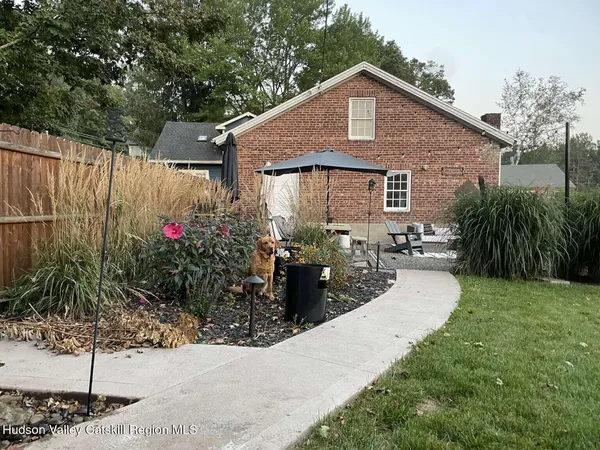 a front view of a house with yard