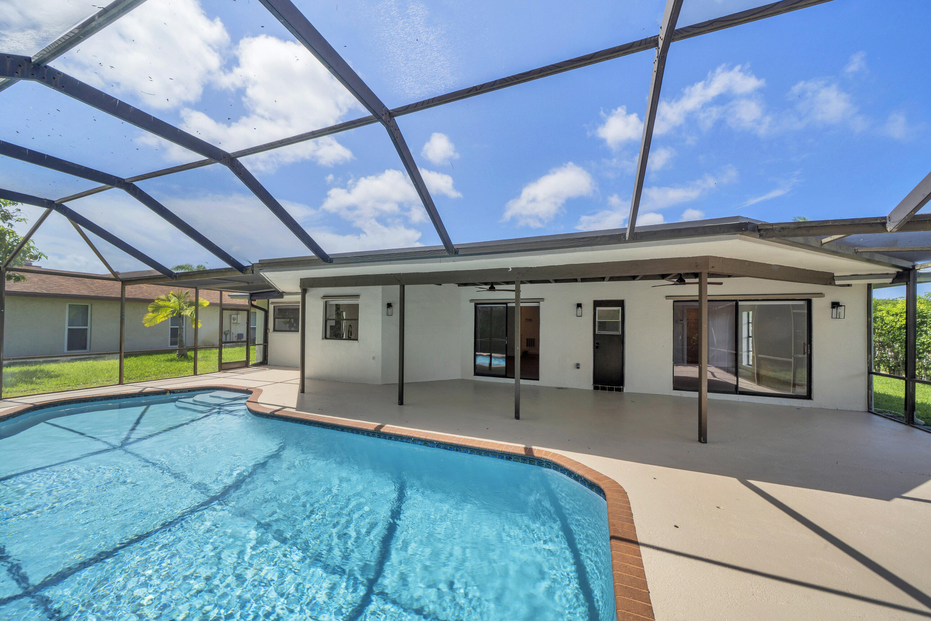 4854 Acorn Drive Boca Raton, FL 33487 - Photo 56 of 74 19 Covered Pool Deck (1)