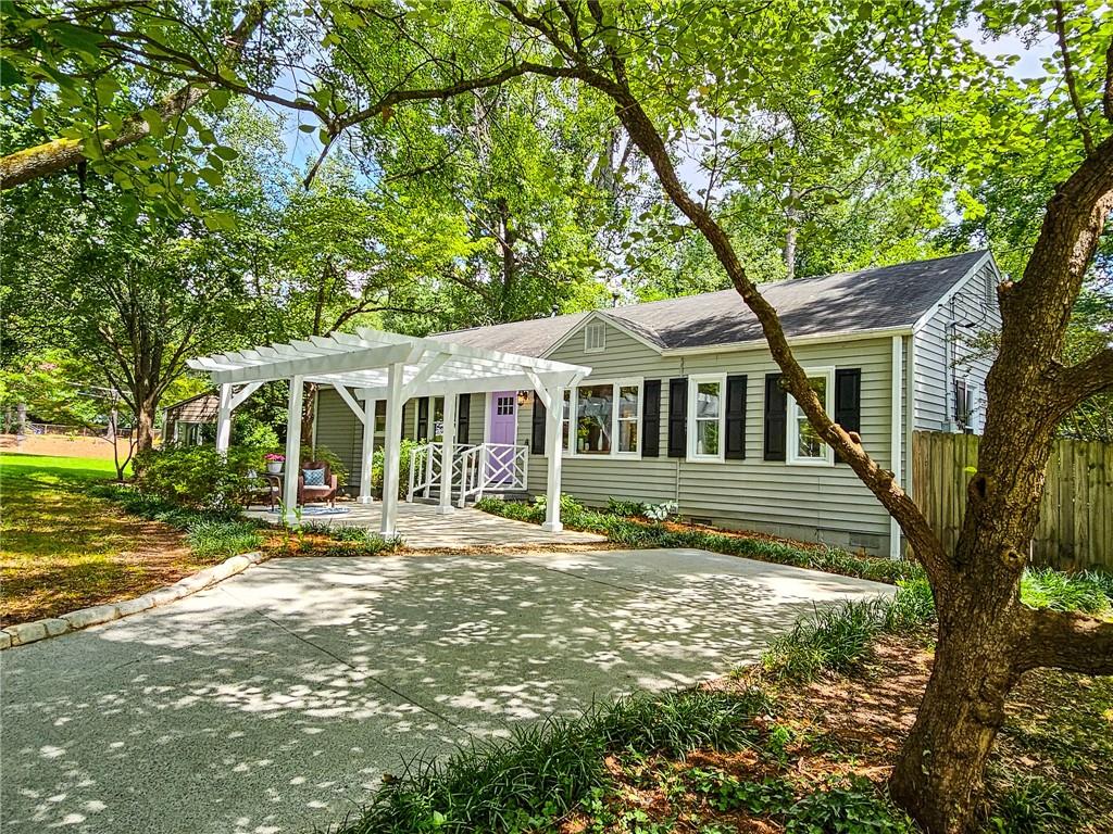 2448 Fernleaf Lane Decatur, GA 30033 - Photo 1 of 1 a front view of a house with a garden
