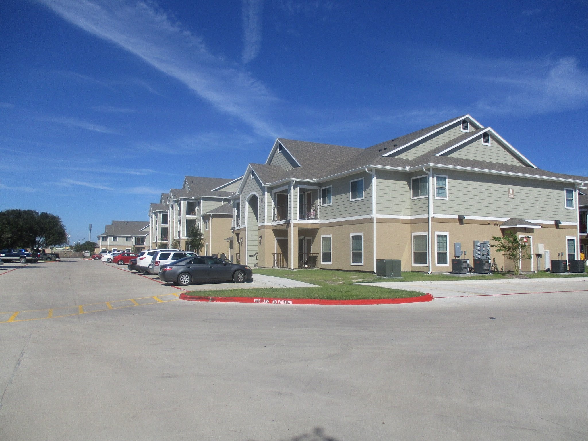 5201 Kostoryz Road Corpus Christi, TX 78415 - Photo 1 of 9 a front view of a house with a yard