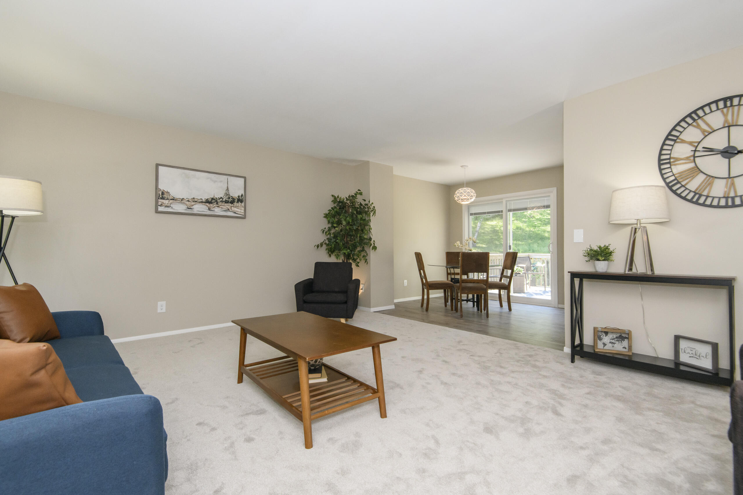 1717 Sunset Ridge Drive West West Bend, WI 53090 - Photo 7 of 28 Living room to kitchen