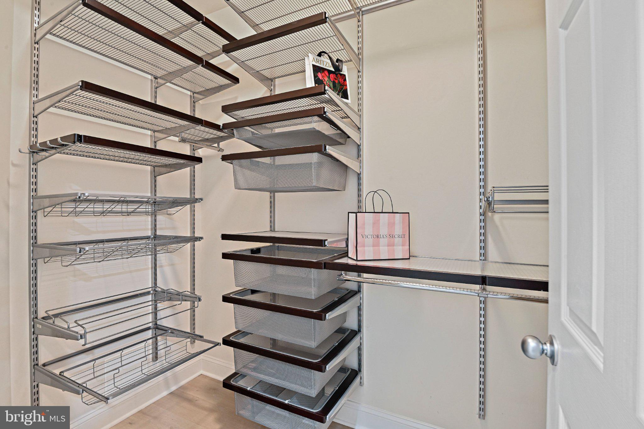 1519 North Point Drive, Unit 202 Reston, VA 20194 - Photo 29 of 49 Sleek, organized closet space awaits.
