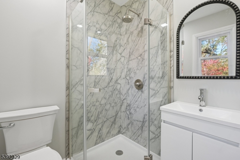 5 Weatherhill Road Lebanon, NJ 08833 - Photo 24 of 47 a bathroom with a sink toilet and shower