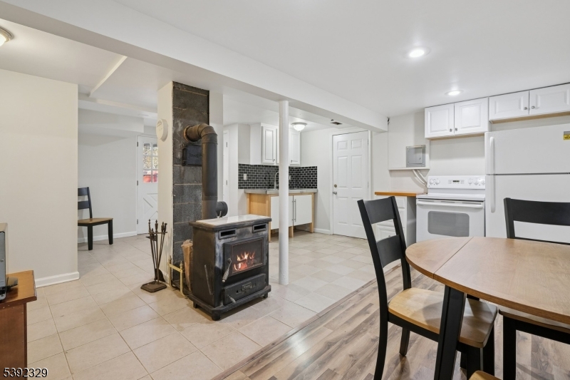 5 Weatherhill Road Lebanon, NJ 08833 - Photo 32 of 47 a living room with furniture a table and chairs