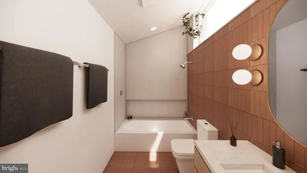 a bathroom with a tub sink and toilet