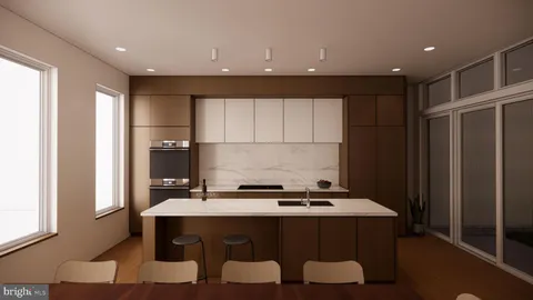 a kitchen with a sink cabinets and window