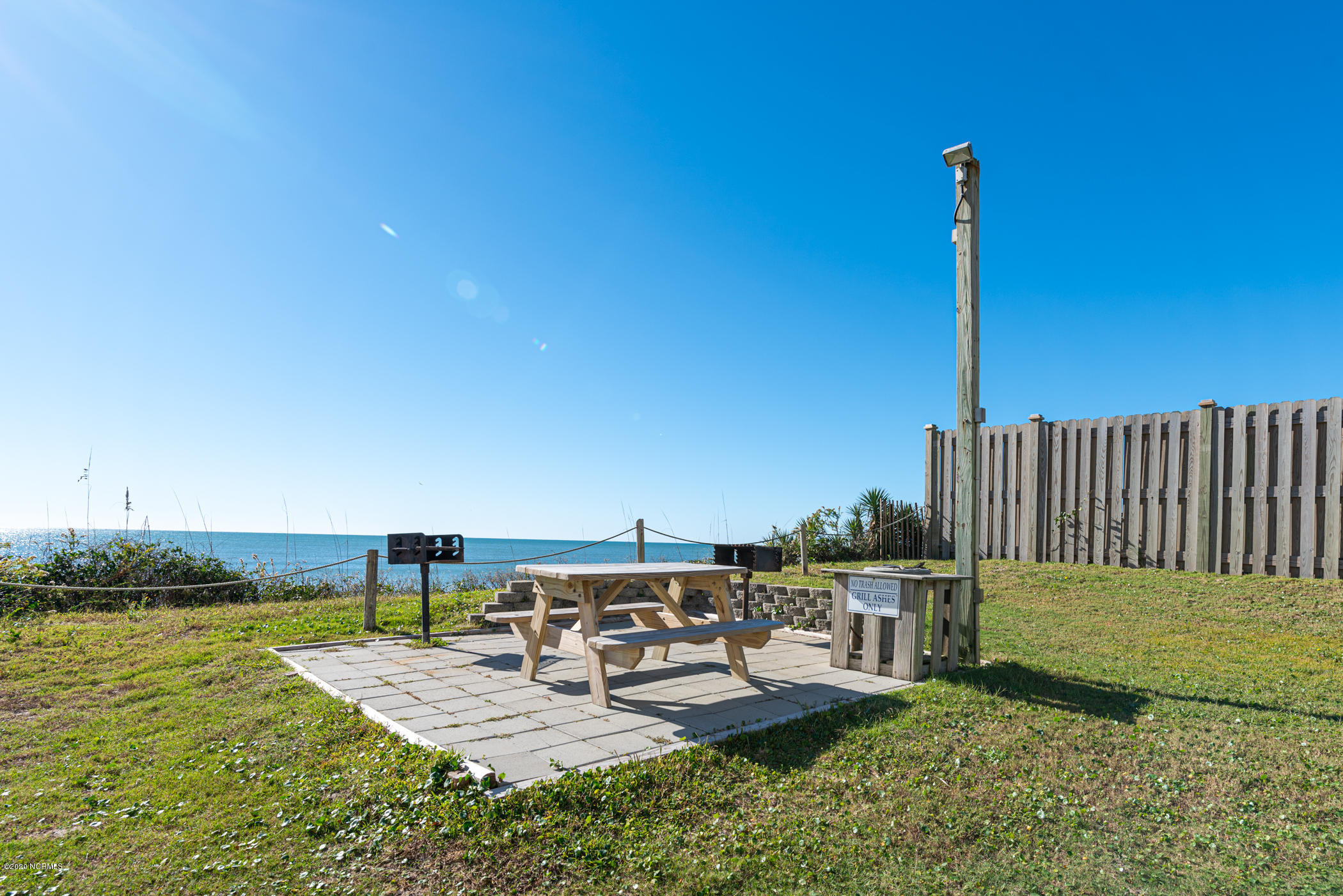 1505 Salter Path Road, Unit 135 Indian Beach, NC 28512 - Photo 32 of 43 Picnic Table near beach access