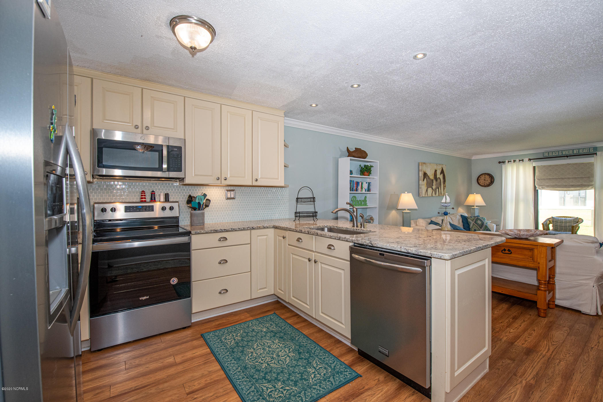 1505 Salter Path Road, Unit 135 Indian Beach, NC 28512 - Photo 8 of 43 Kitchen w/SS appliances