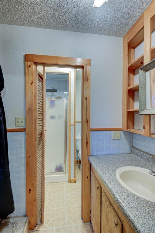 862 Par Road 116 Minden, LA 71055 - Photo 14 of 28 a bathroom with a granite countertop sink and a mirror
