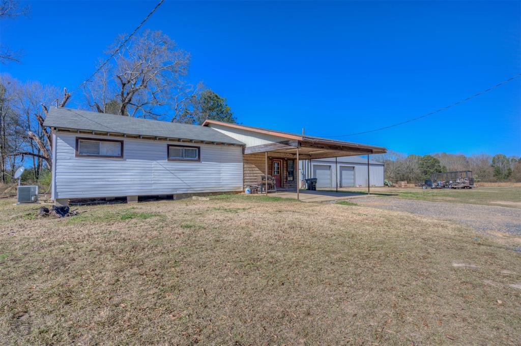 862 Par Road 116 Minden, LA 71055 - Photo 27 of 28 a front view of a house with a garden