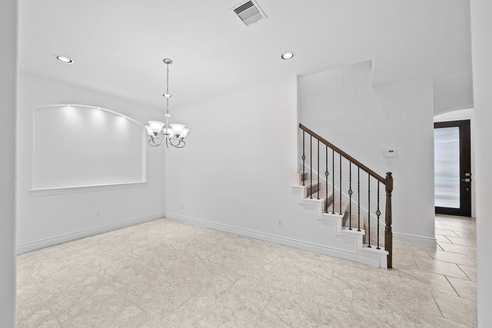 24211 Cordova Brook Lane Katy, TX 77494 - Photo 11 of 42 wooden floor in an empty room with a window