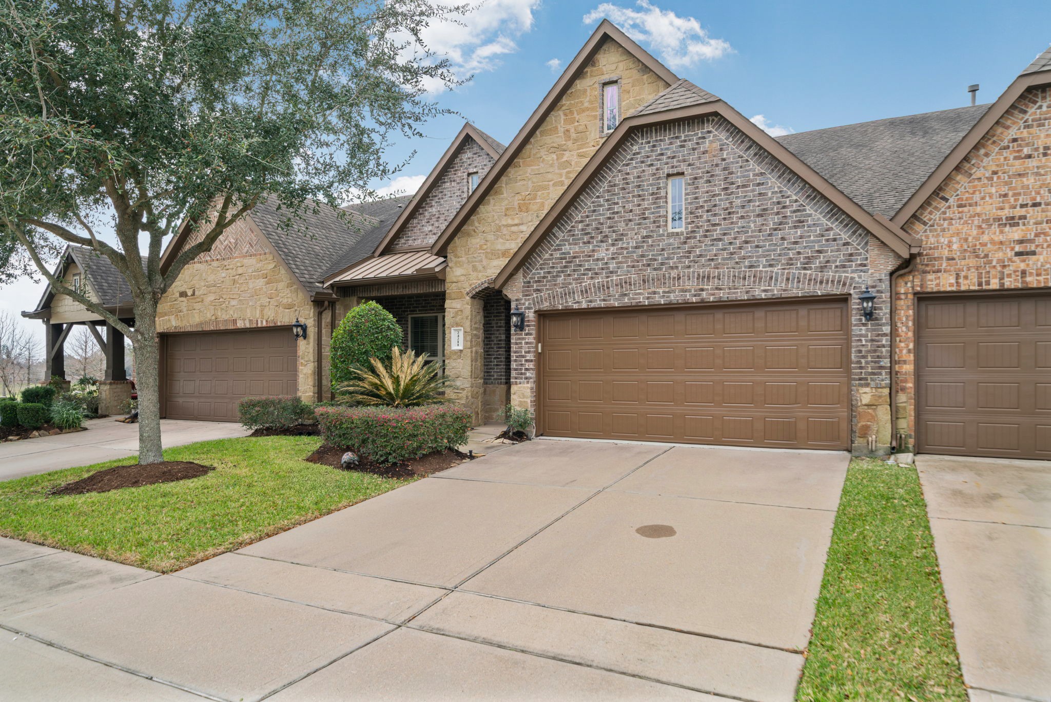 24211 Cordova Brook Lane Katy, TX 77494 - Photo 2 of 42 a front view of a house with garden