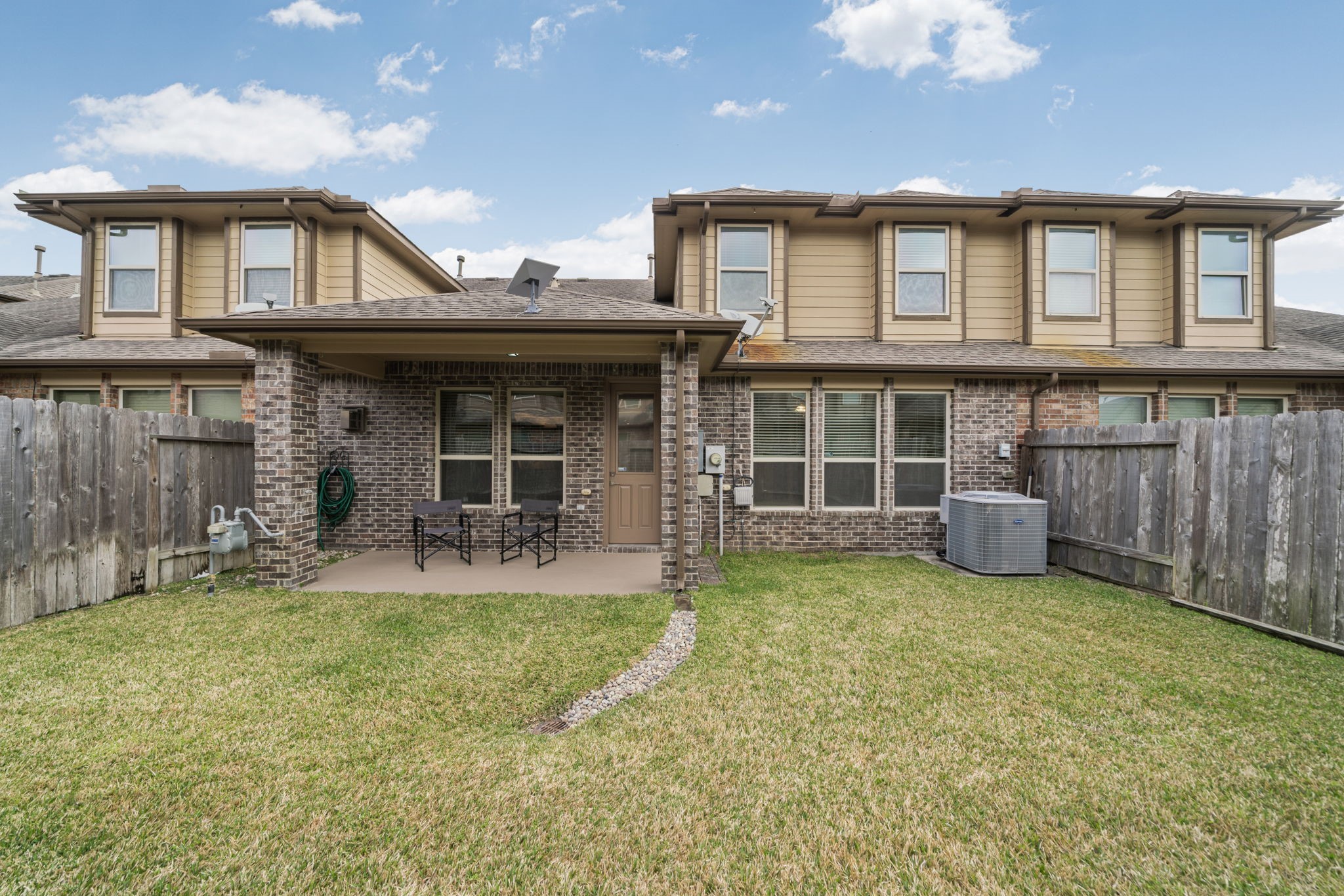 24211 Cordova Brook Lane Katy, TX 77494 - Photo 39 of 42 a view of a house with a yard and sitting area