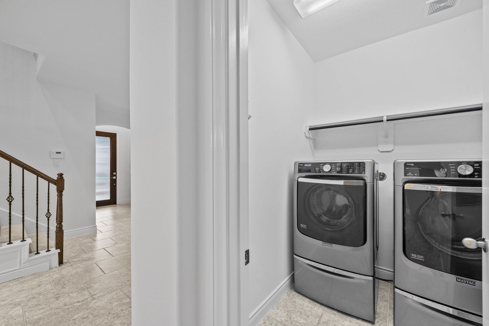 24211 Cordova Brook Lane Katy, TX 77494 - Photo 10 of 42 a utility room with washer and dryer