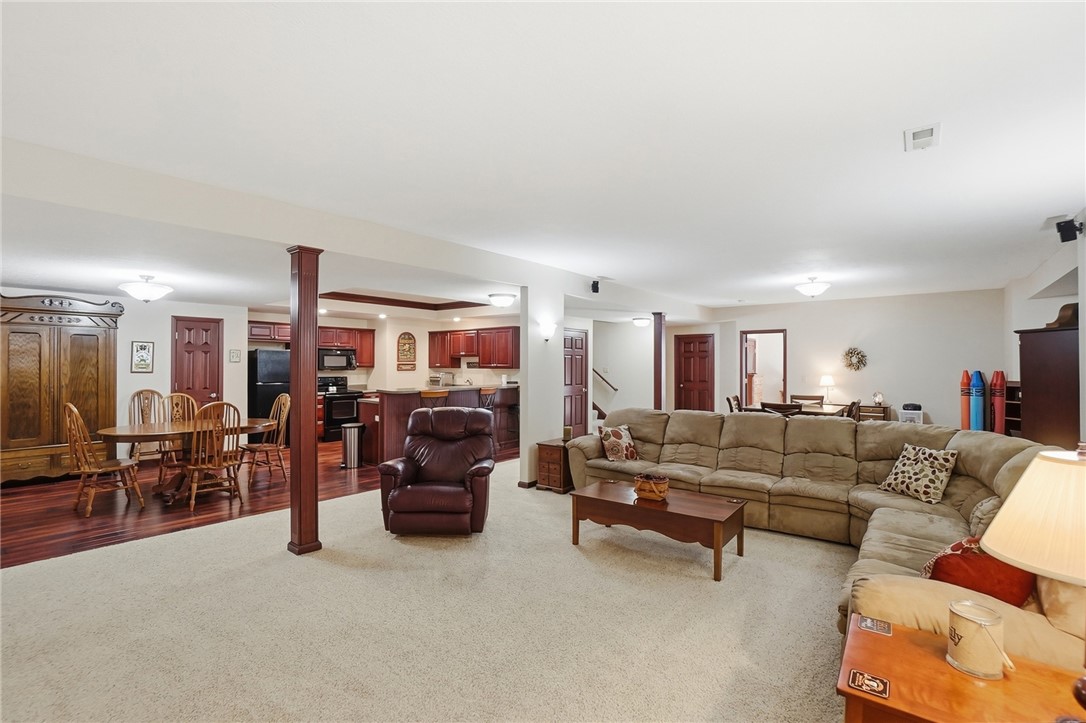 710 Governors Road Troy, OH 45373 - Photo 56 of 56 This expansive basement offers an open floorplan, ideal for entertaining and relaxed living.