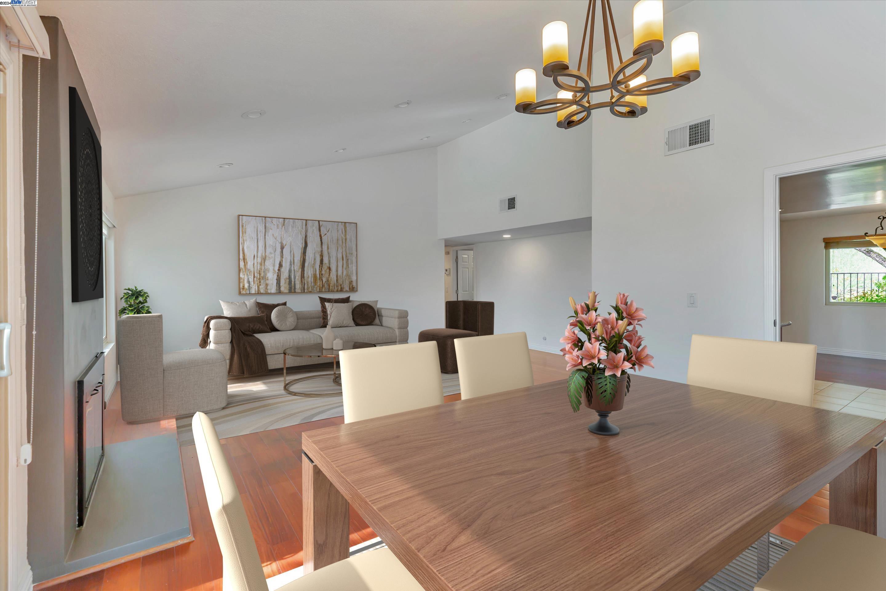 35 Shadow Mountain Oakland, CA 94605 - Photo 6 of 8 a living room with furniture wooden floor and a chandelier
