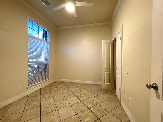 a view of an empty room and window