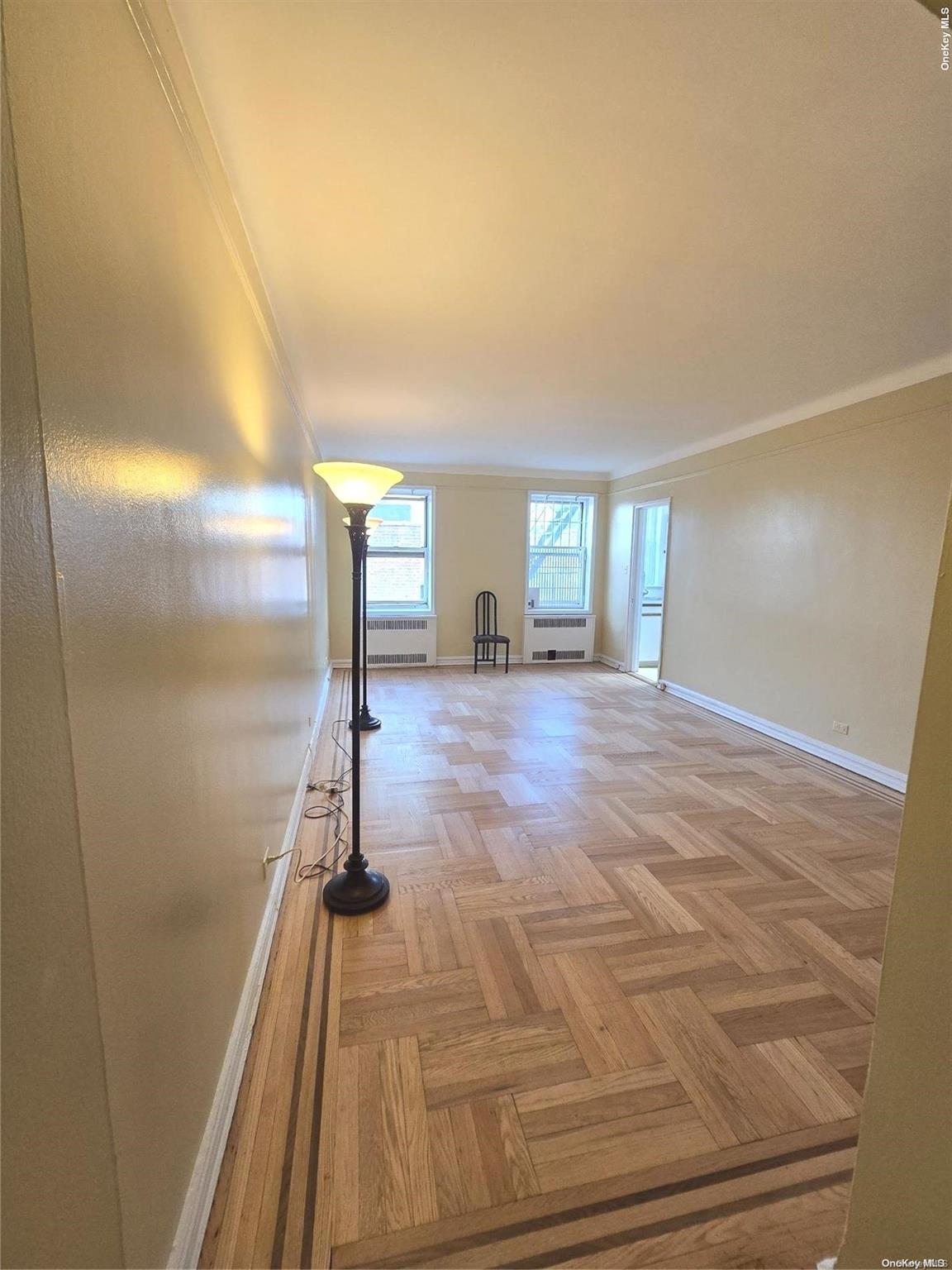 65-41 Booth Street, Unit 6K Queens, NY 11374 - Photo 9 of 15 Living/bedroom