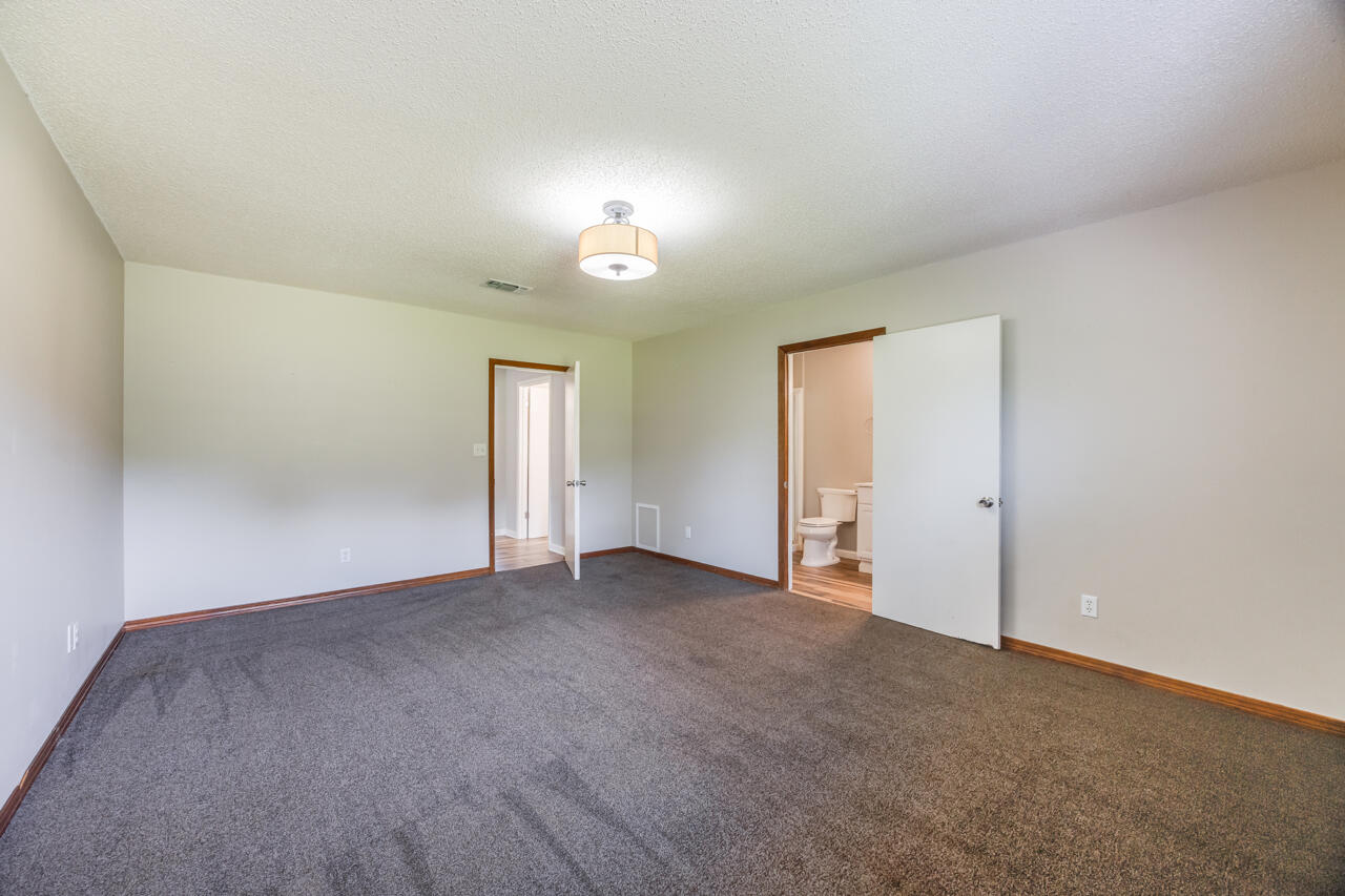 5811 Monroe Street Baker, FL 32531 - Photo 23 of 33 a view of an empty room with a window