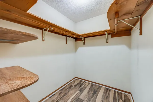 a view of a room with racks on the wall