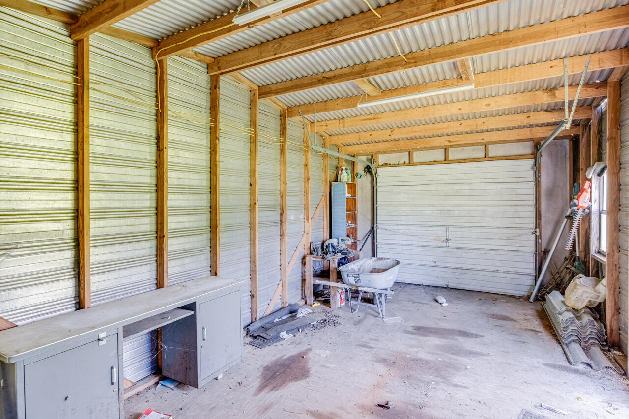 5811 Monroe Street Baker, FL 32531 - Photo 33 of 33 a view of room with stairs and a window