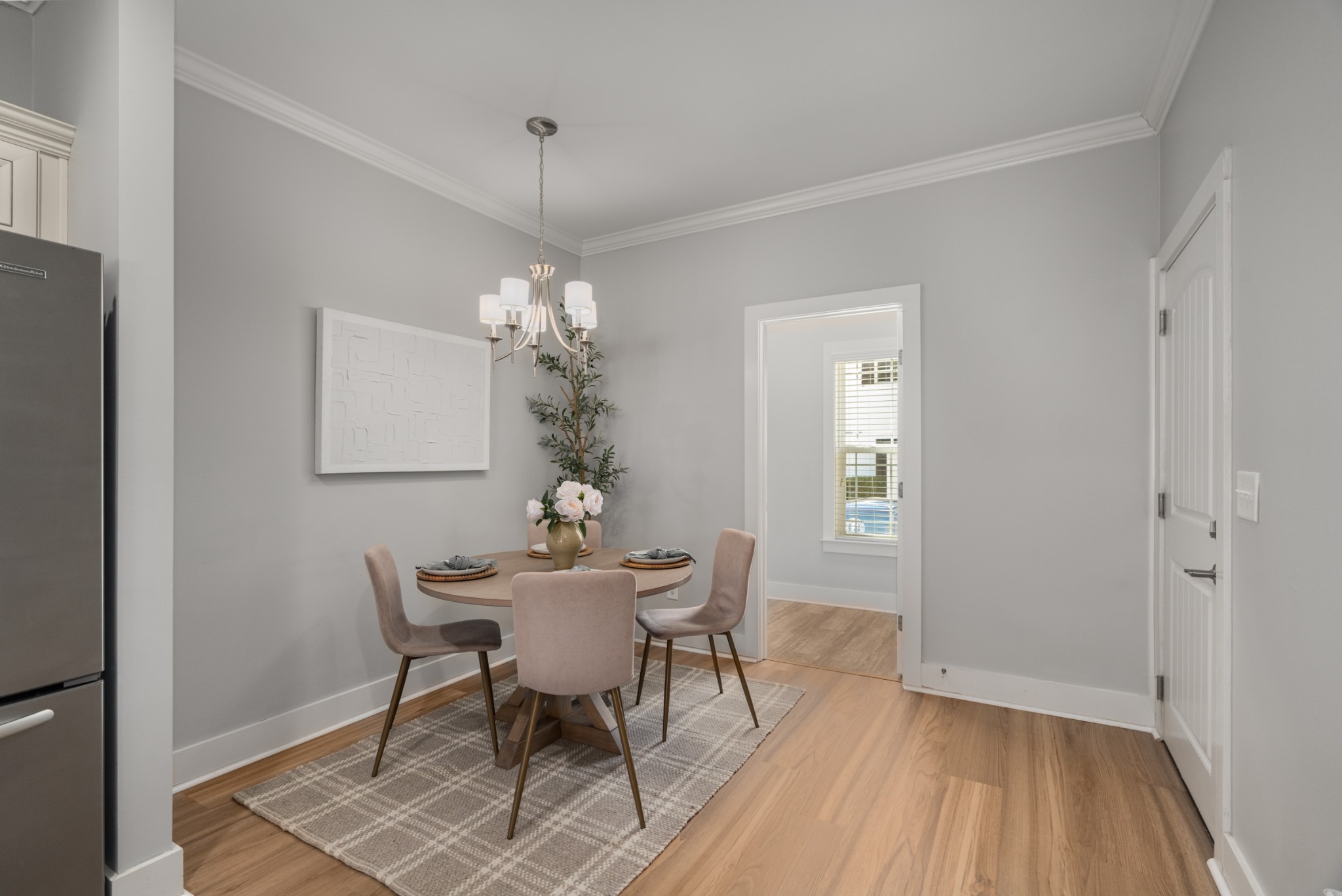 4021 Viola Lane Franklin, TN 37069 - Photo 16 of 34 a view of a dining room with furniture and chandelier