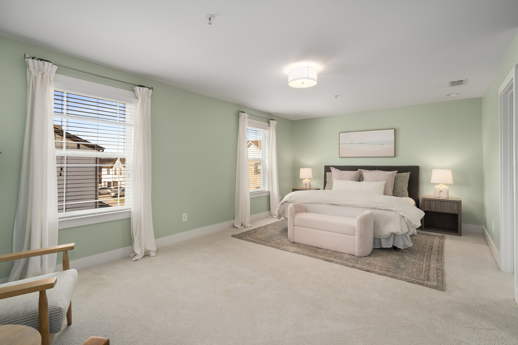 4021 Viola Lane Franklin, TN 37069 - Photo 20 of 34 a bedroom with a bed and a couch