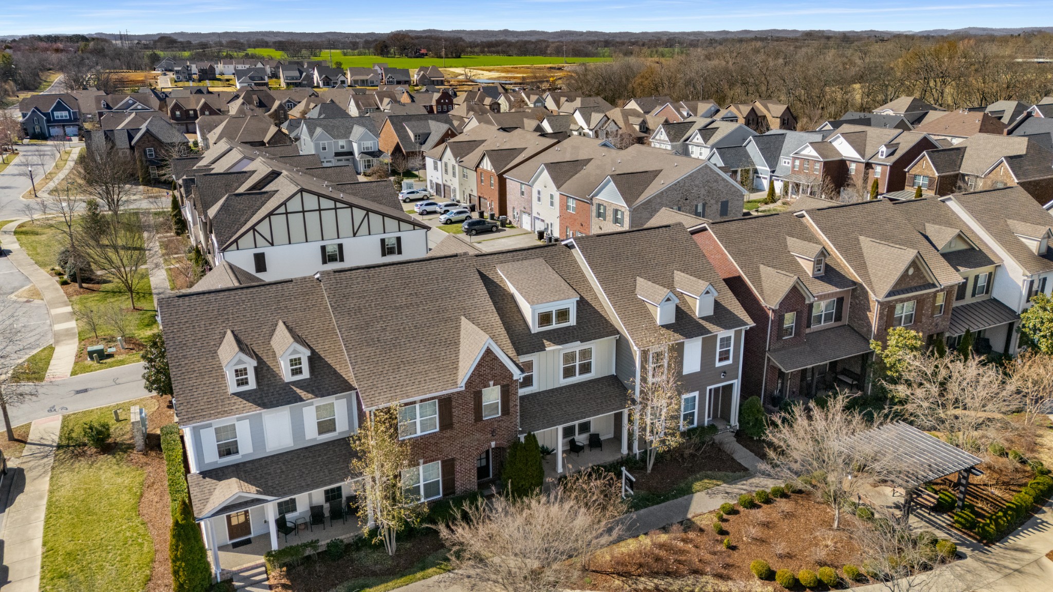 4021 Viola Lane Franklin, TN 37069 - Photo 33 of 34 an aerial view of a residential apartment building with a yard