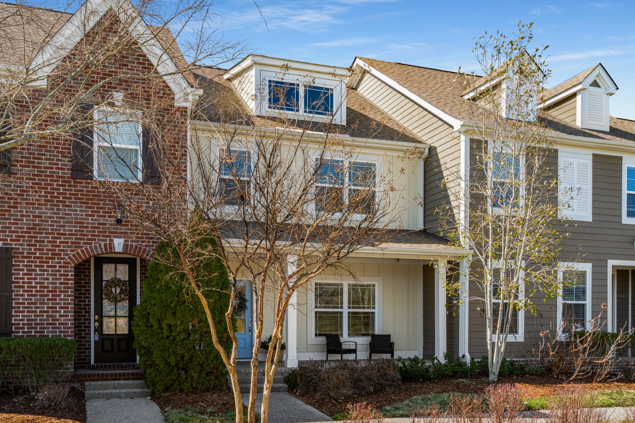 4021 Viola Lane Franklin, TN 37069 - Photo 4 of 34 a view of a white building among the tree