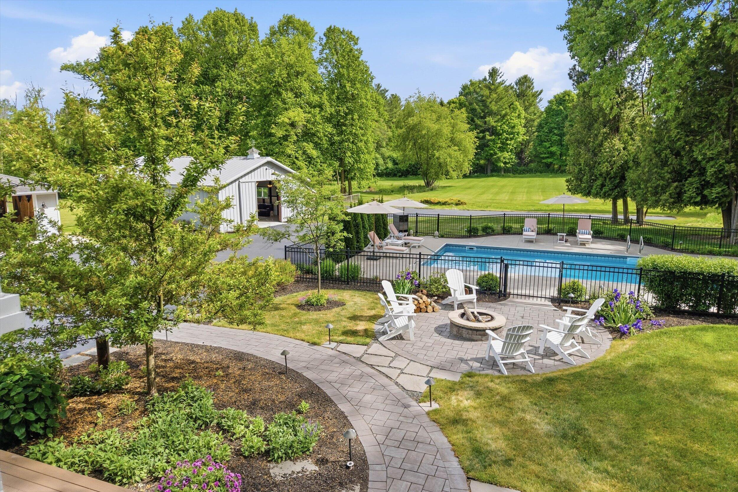 9431 Hawthorne Road Mequon, WI 53097 - Photo 44 of 67 Extensive landscaping in back yard