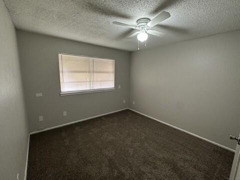 4408 Chicago Avenue Lubbock, TX 79414 - Photo 13 of 19 an empty room with a window
