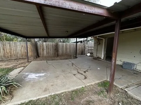a view of a backyard of a house