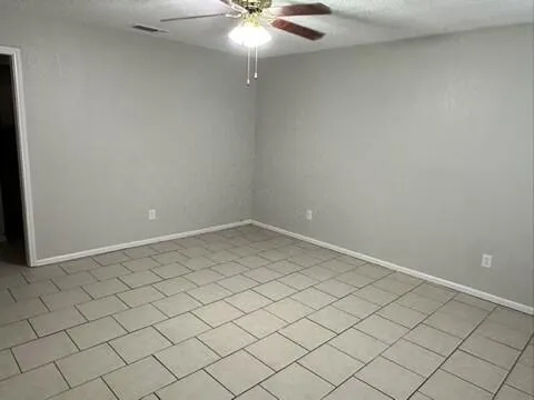 en empty room with fan