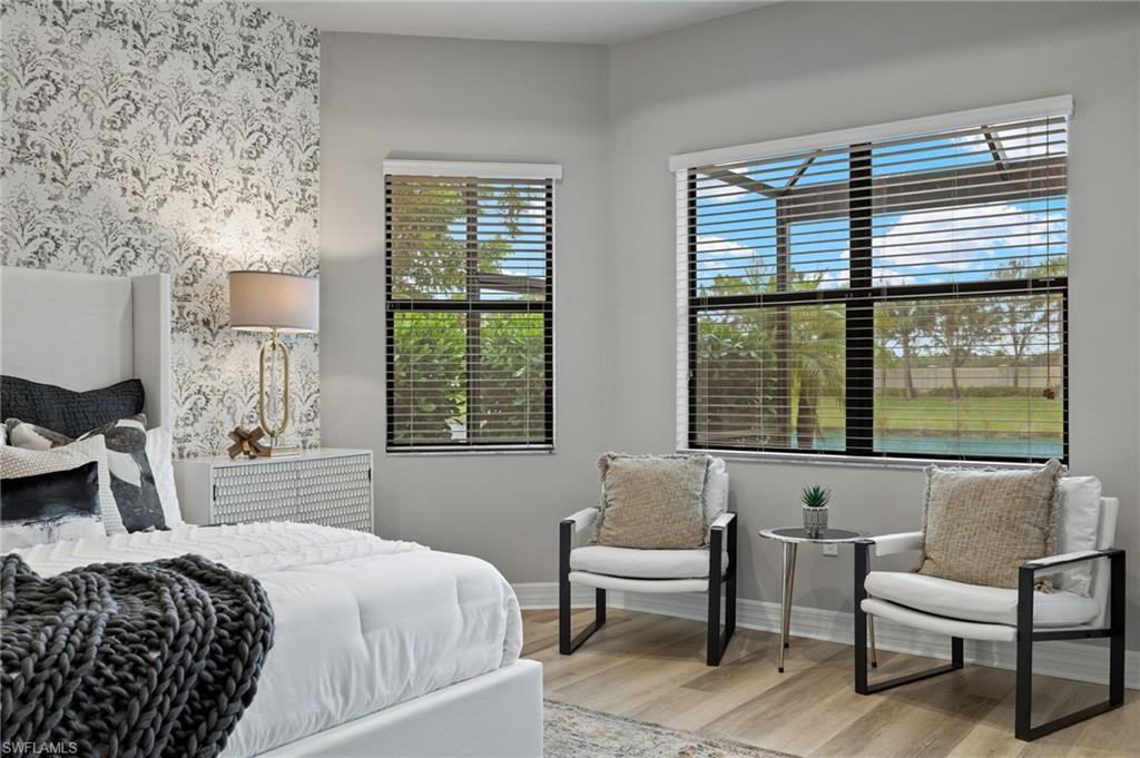 4398 Caldera Circle Naples, FL 34119 - Photo 30 of 50 a bedroom with a bed and a window