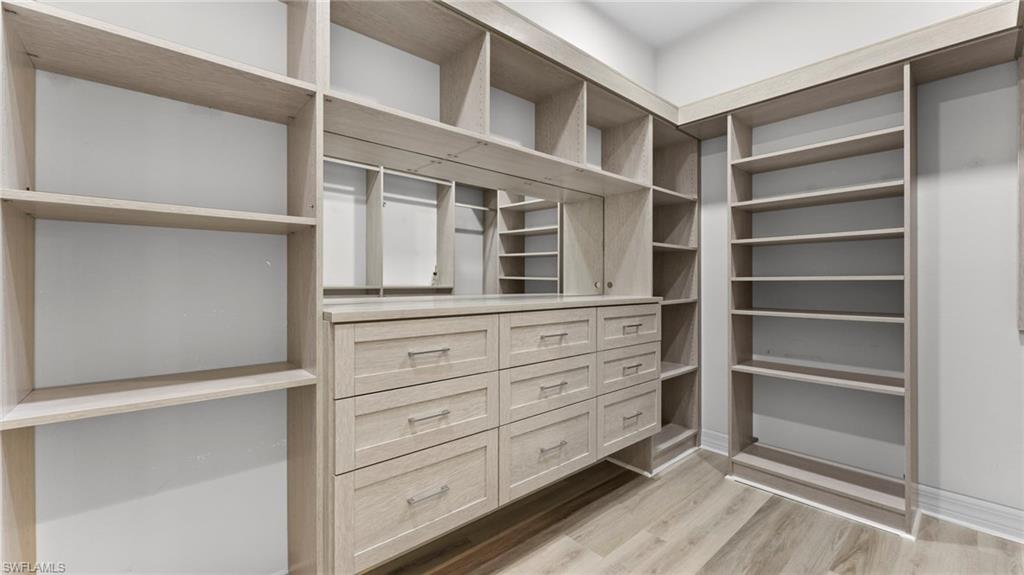 4398 Caldera Circle Naples, FL 34119 - Photo 34 of 50 a view of an empty walk in closet