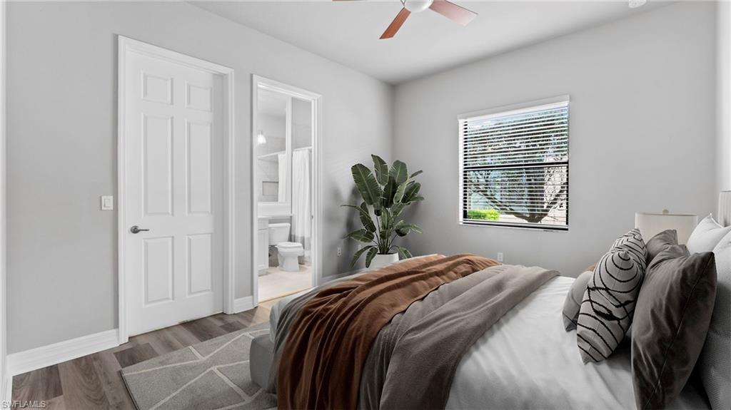 4398 Caldera Circle Naples, FL 34119 - Photo 38 of 50 a bedroom with a bed and a window