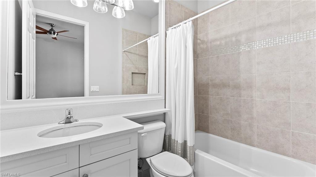 4398 Caldera Circle Naples, FL 34119 - Photo 39 of 50 a bathroom with a sink toilet and shower
